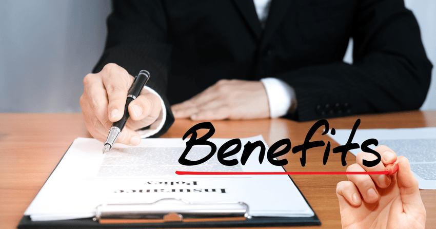 An agent writing on a document depicting the benefits of hiring panama residency agent.